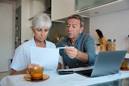 Older couple at laptop for web